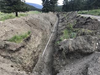 Digging begins-Placing 2 inch pipe.